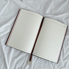 Interior view of the Christian faith journal with lined pages for writing and reflection