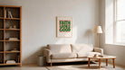Faith Looks Good Christian poster displayed above a cream sofa in a bright living room