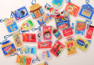 Assorted playful Love Supermarket acrylic keychains.