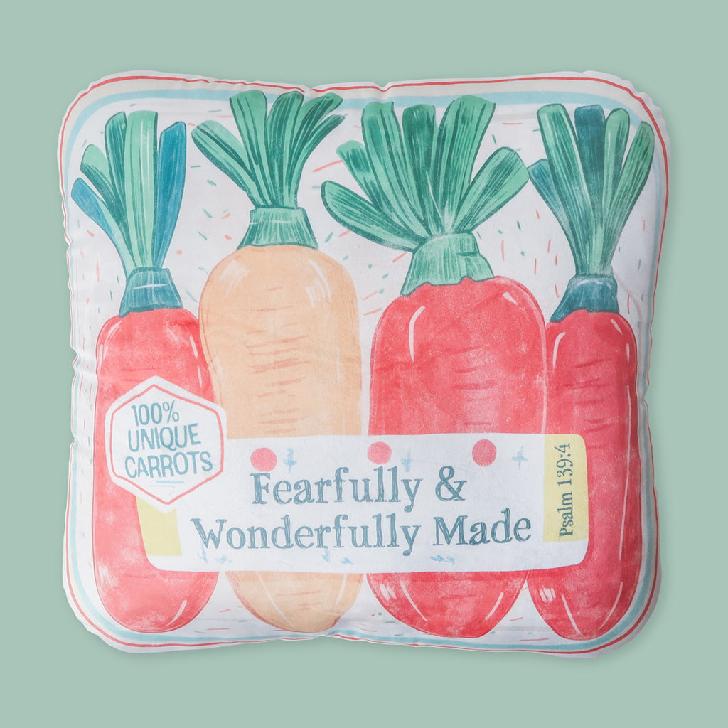 Christian-themed plush pillow featuring colorful carrots with the message 'Fearfully & Wonderfully Made' from Psalm 139:14, symbolizing uniqueness and faith.