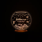 Christian night light with fishbowl design engraved with ‘Follow Me, and I Will Make You Fishers of Men’ from Matthew 4:19 – faith-inspired LED lamp from The Commandment Co