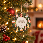 For God So Loved the World John 3:16 Christmas tree bauble hanging on a warmly lit festive tree