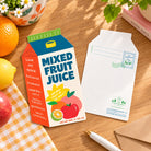 Fruit Juice of the Spirit milk carton shaped card front and back displayed on a wooden desk