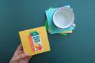 Grocery-inspired Love Supermarket Christian wooden coaster assortment.