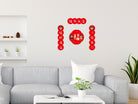Chinese New Year home wall decor featuring “福到我家” Blessings in My House red couplet displayed above a sofa in a modern living room setting.