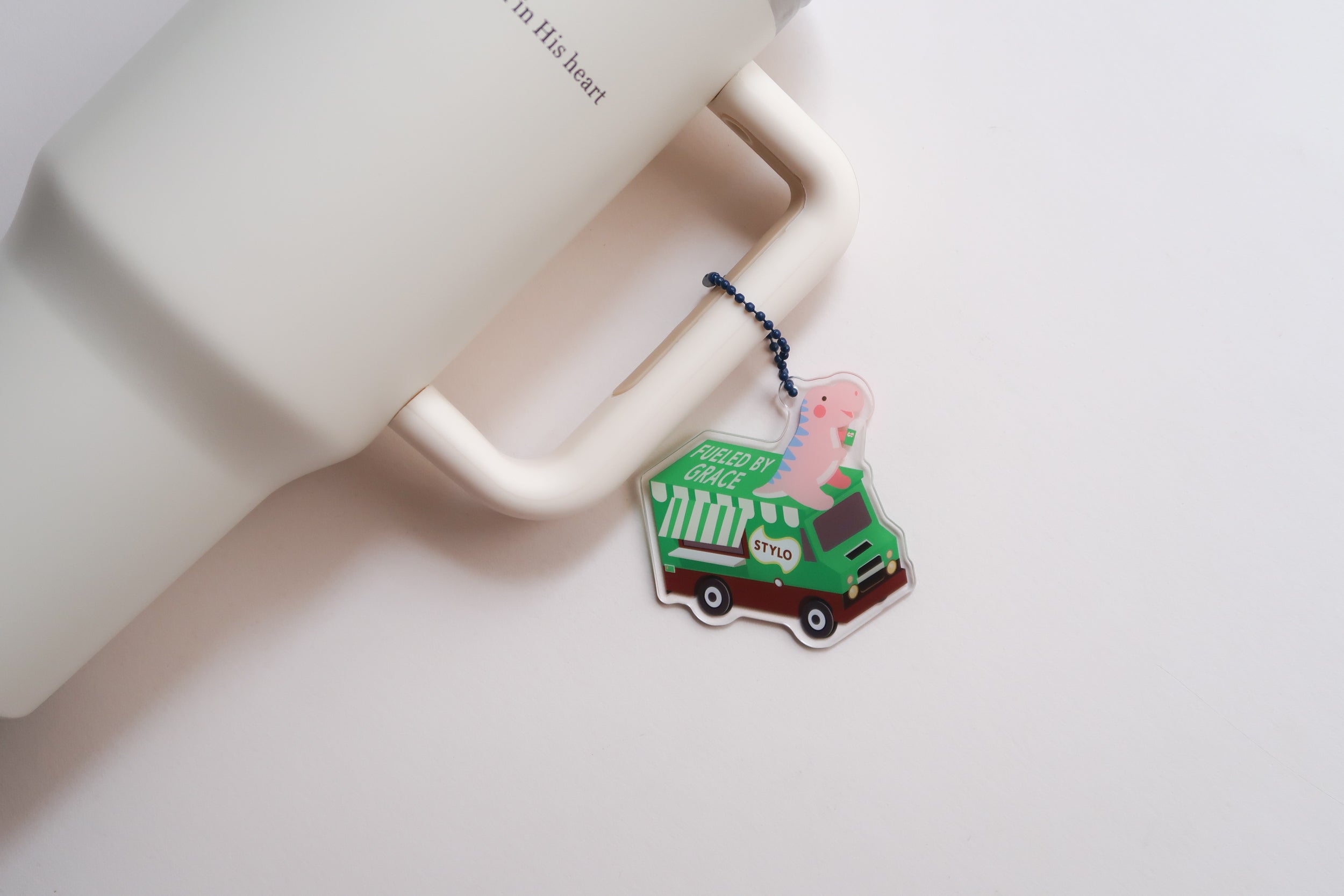 Fueled by grace dinosaur food truck Christian keychain on mug – inspirational faith accessory by The Commandment Co