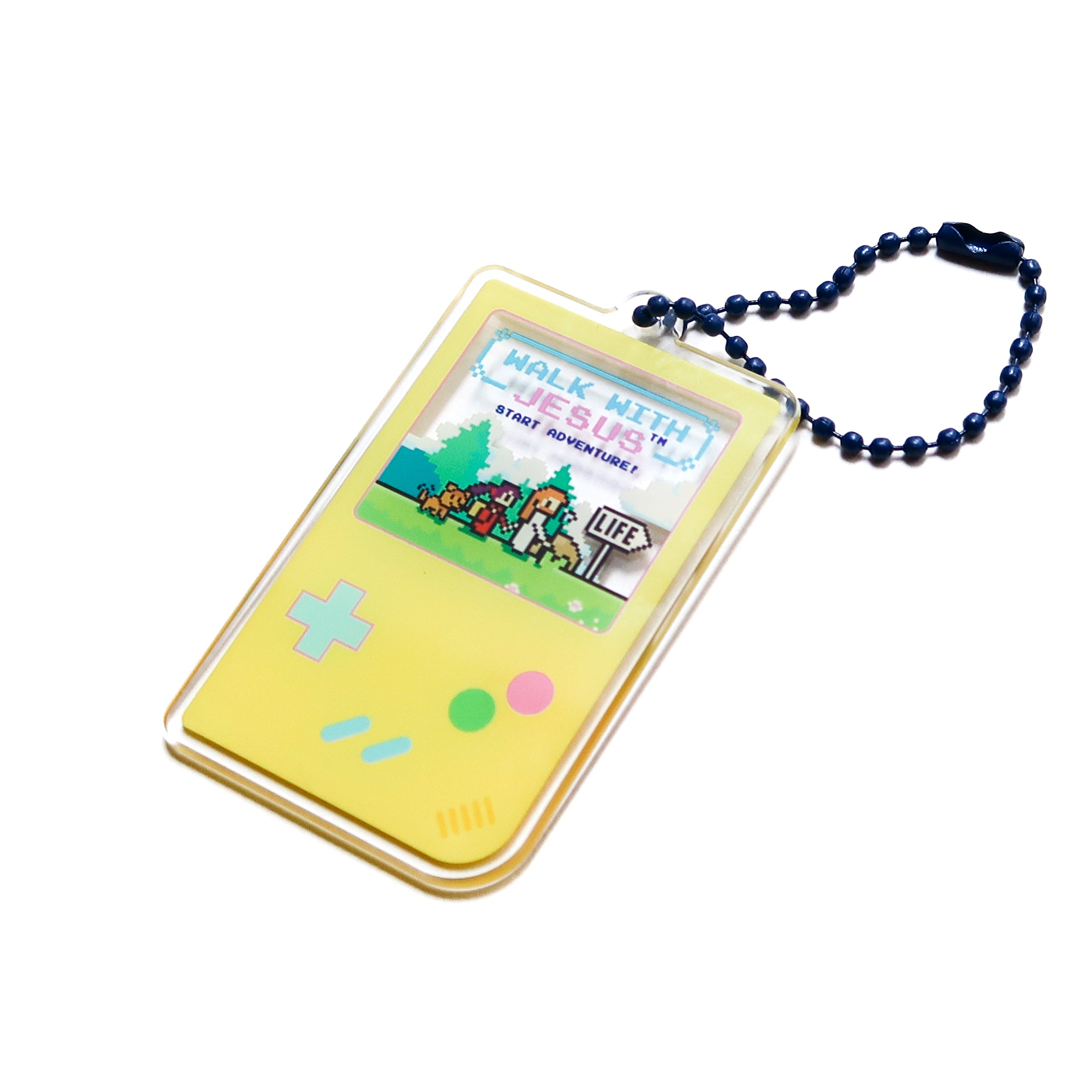 crylic keychain shaped like a retro handheld game console displaying “Walk with Jesus” and “Start Adventure” on the screen, 6.53 cm x 3.95 cm, with a blue ball-chain
