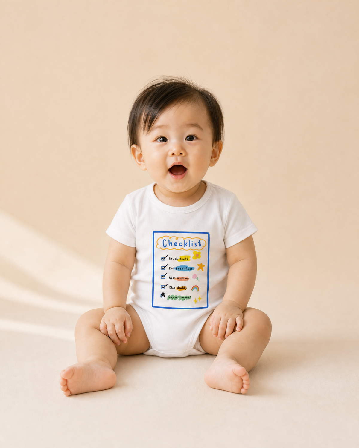 Baby wearing the Checklist Christian romper with colourful faith-based design