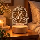 Glorify the Lord with Me Psalm 34 Christian acrylic night light glowing on its wooden base in a warm bedroom