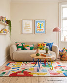 God Goes Before Me poster displayed with another Christian print in a colourful living room