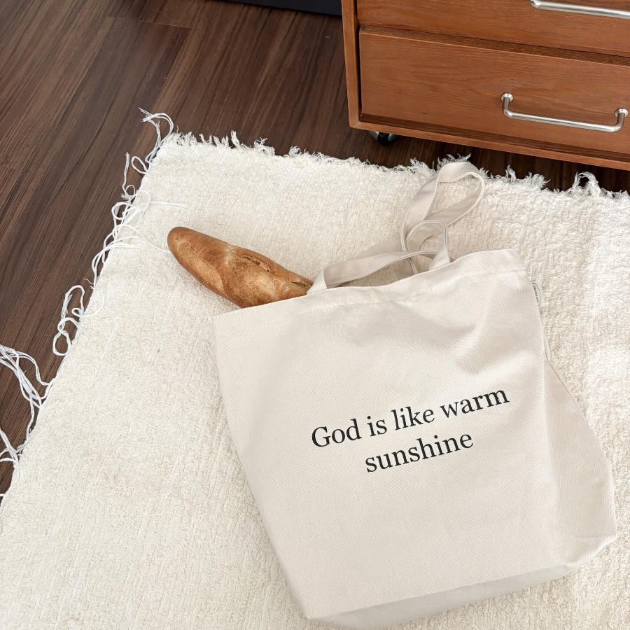 Faith-based tote bag with inspirational message and scripture verse design