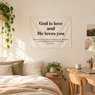 God is love and He loves you scripture wall tapestry hanging above a cosy bed and desk