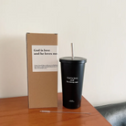 Christian faith tumbler placed on desk for daily encouragement and hydration