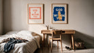 Coral and blue God Is Within You Christian posters displayed above a wooden desk