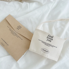  Reusable cup holder with "God loves you" and Jeremiah 31:3 Bible verse, paired with a matching kraft envelope, perfect Christian eco-friendly gift for daily encouragement.