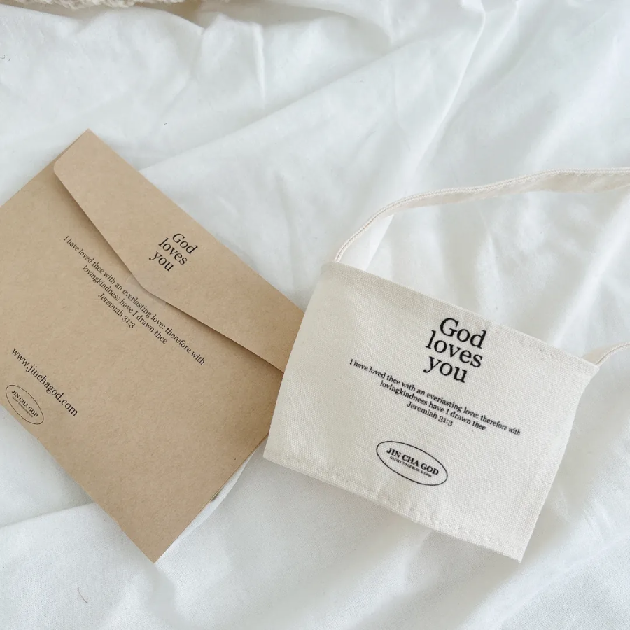  Reusable cup holder with "God loves you" and Jeremiah 31:3 Bible verse, paired with a matching kraft envelope, perfect Christian eco-friendly gift for daily encouragement.