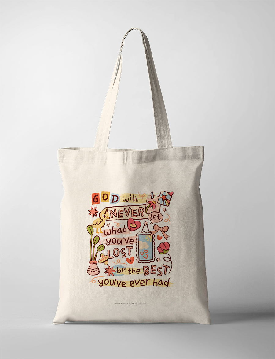 Christian tote bag featuring “God will never let what you’ve lost be the best you’ve ever had” with playful hand-lettered artwork