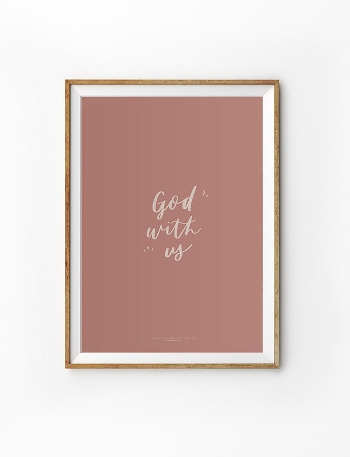 Minimalist framed art print with the text 'God with us' on a muted pink background