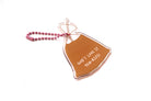 Angled view of drink bag acrylic keychain featuring “God’s Love Is Teh-rific” with pink ball chain