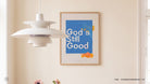God’s Still Good blue Christian poster displayed on a warm neutral wall