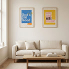 God’s Still Good poster displayed with another Christian print above a living room sofa