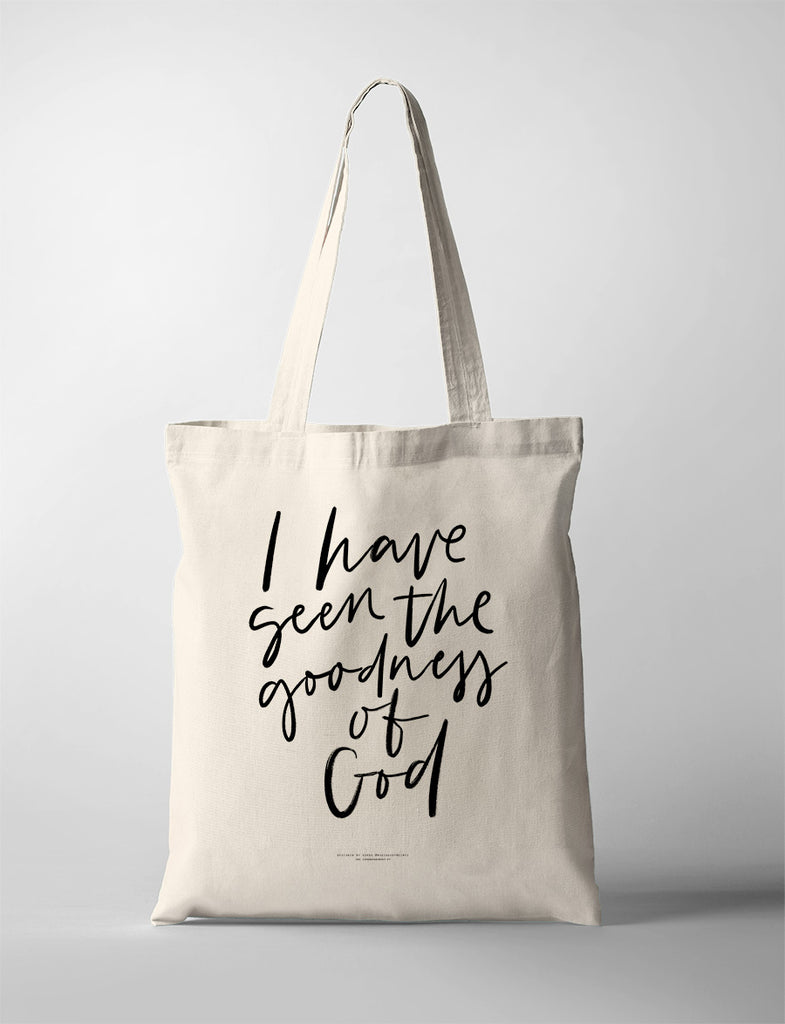 Beige tote bag with the words 'I have seen the goodness of God' printed in black handwritten-style script on the front."