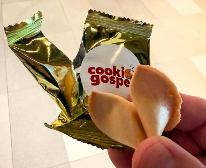 Opened Gospel Cookie revealing Bible verse message inside fortune cookie