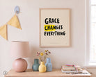 Grace Changes Everything Christian poster styled above pastel decor
