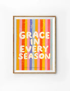 Grace in Every Season striped Christian poster with colourful vertical bands and cream lettering