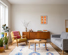 Grace in Every Season striped poster displayed in a bright living room above a wooden sideboard