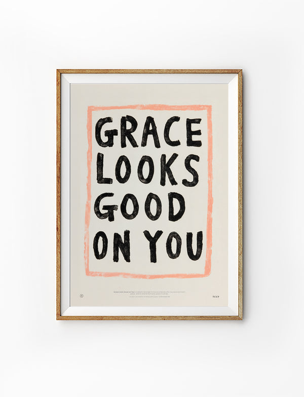 Grace Looks Good on You Christian poster in a light wood frame