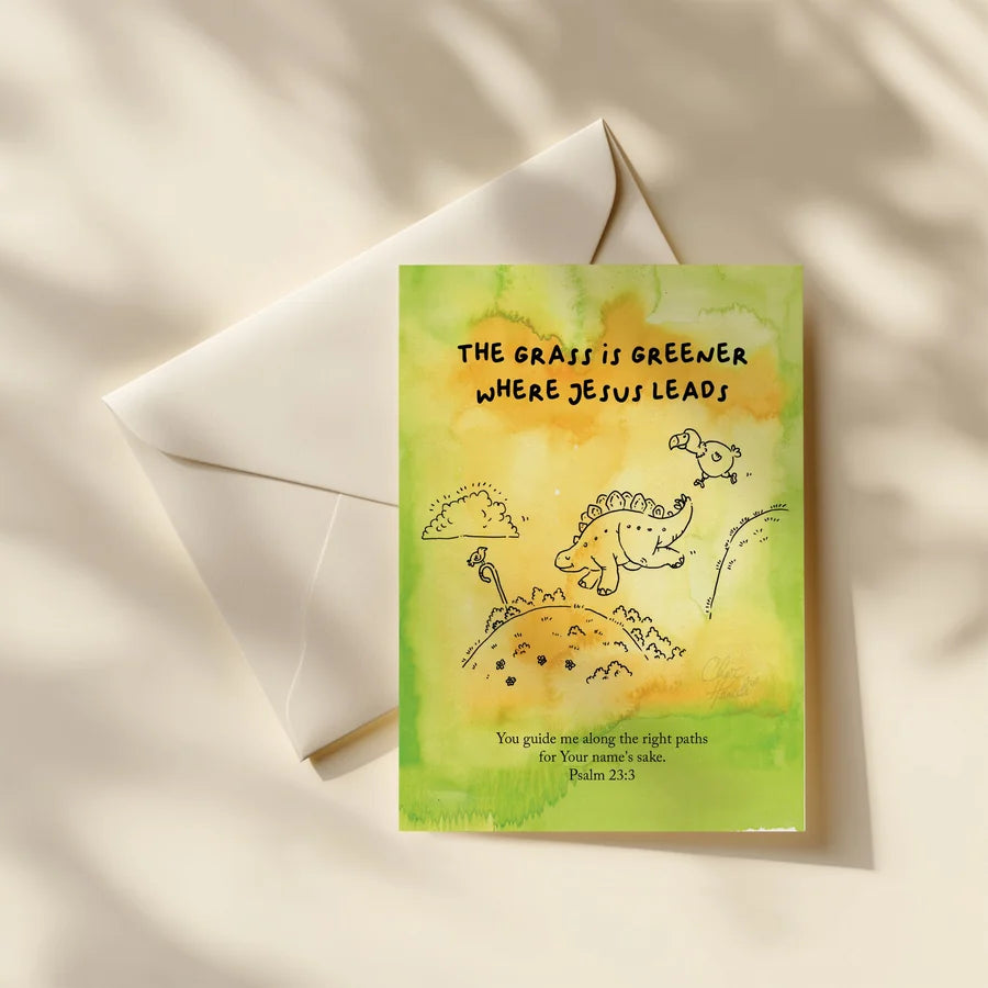 Grass is Greener Where Jesus Leads Christian postcard with dinosaur illustration and Psalm 23:3 verse