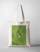 Green Pastures CollabPlus+ tote bag inspired by Psalm 23:2, with two figures resting in a lush green meadow, designed by @nartellac
