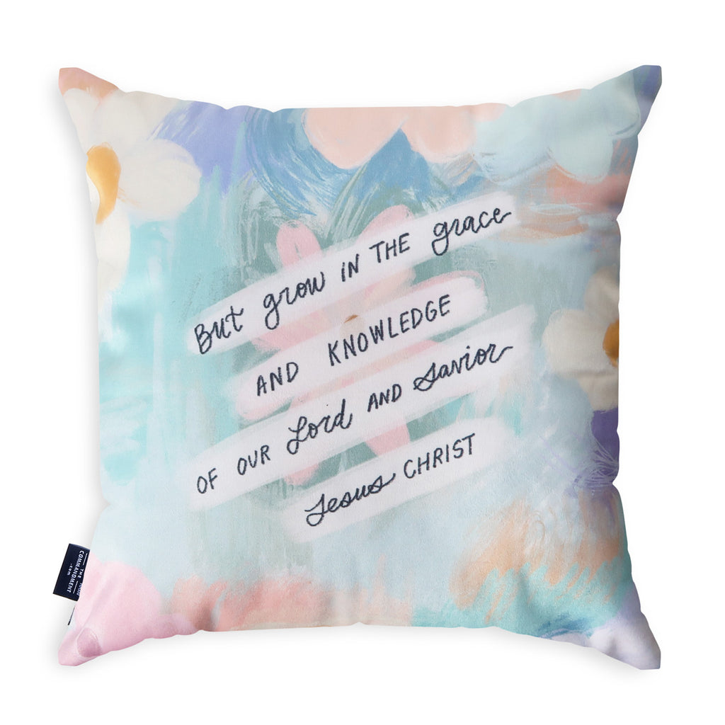 Decorative throw pillow with the text 'But grow in the grace and knowledge of our Lord and Savior Jesus Christ,' featuring a floral and pastel design, perfect for Christian faith-based home decor.