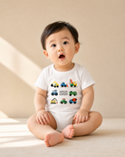 Baby wearing Growing Stronger Everyday construction vehicle romper