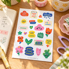 Growth Christian journaling sticker sheet on wooden stationery desk
