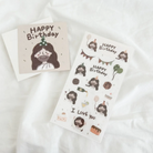 "Happy Birthday" sticker sheet and matching postcard featuring cute illustrations of Jesus, cakes, balloons, and party decorations, perfect for sharing Christian encouragement and simple happiness.