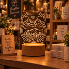 He Makes Everything Beautiful in His Time Christian night light glowing in a warm gift shop setting.
