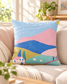 Psalm 23 He Makes Me Lie Down in Green Pastures Christian cushion cover with pastel landscape on a sofa.