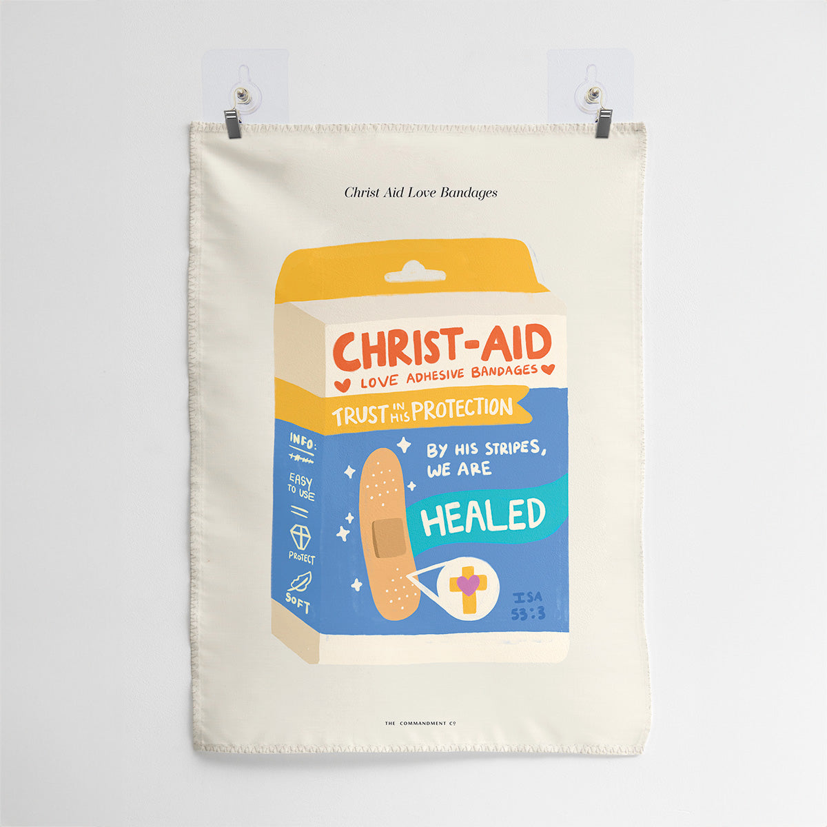 Wall tapestry featuring Christ-Aid Love Bandages design with scripture reference Isaiah 53:5, highlighting healing through His stripes.