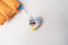 Soft and cute heart plush keychain with Jesus and a sheep illustration, offering comfort and inspiration with 'My Shepherd Leads Me' message.
