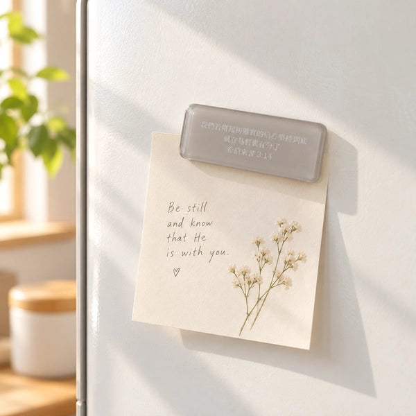 Hebrews 3:14 Chinese Scripture magnet holding an encouragement note on a white fridge.