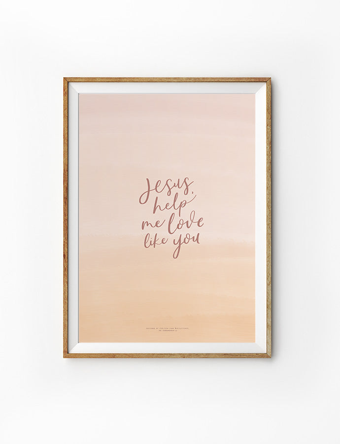 Framed inspirational wall art with the phrase 'Jesus, help me love like you' on a soft peach background.