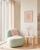 Holy and Happy Christian poster styled in a soft pastel reading corner