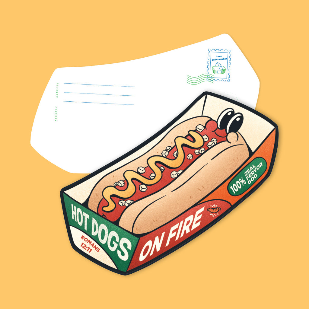 Christian postcard featuring a Hot Dogs on Fire design with Romans 12:11, encouraging zeal and fervor for God, part of the Love Supermarket series.