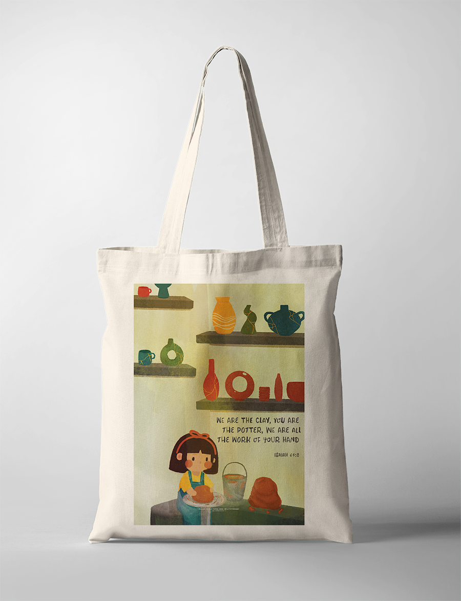 Christian tote bag featuring a cute illustration of a girl making pottery, surrounded by colorful clay pots and vases, with the Bible verse "We are the clay, you are the potter, we are all the work of your hand" from Isaiah 64:8, inspiring simple happiness and faith.