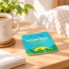I Lift My Eyes to the Mountains Christian coaster styled on a warm sunlit table