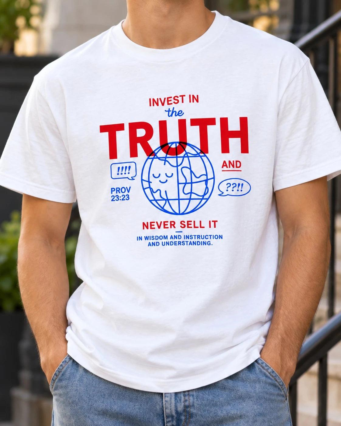 Lifestyle photograph of a man wearing the white Invest in the Truth Christian T-shirt outdoors.