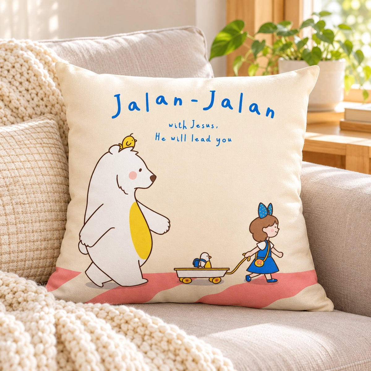 Jalan-Jalan with Jesus Christian cushion cover styled on a cosy sofa
