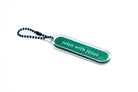 Acrylic keychain designed like a street sign with "Jalan with Jesus," from The Commandment Co, Singapore.